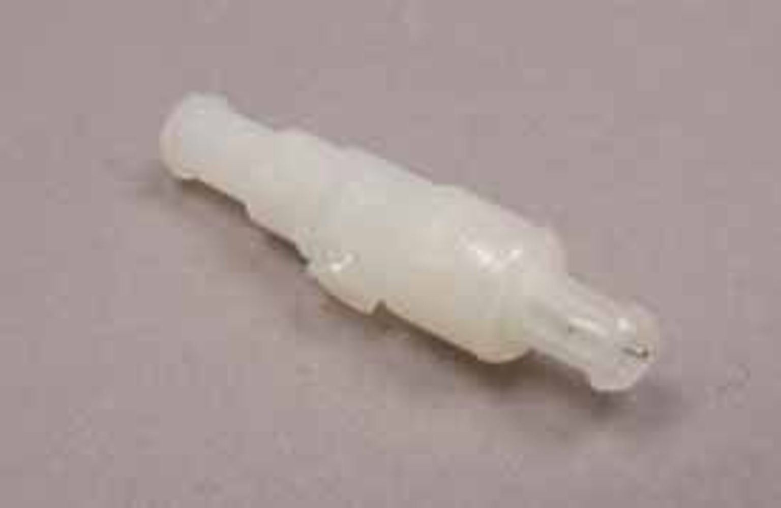 Tilbakeslagsventil spylerbeholder