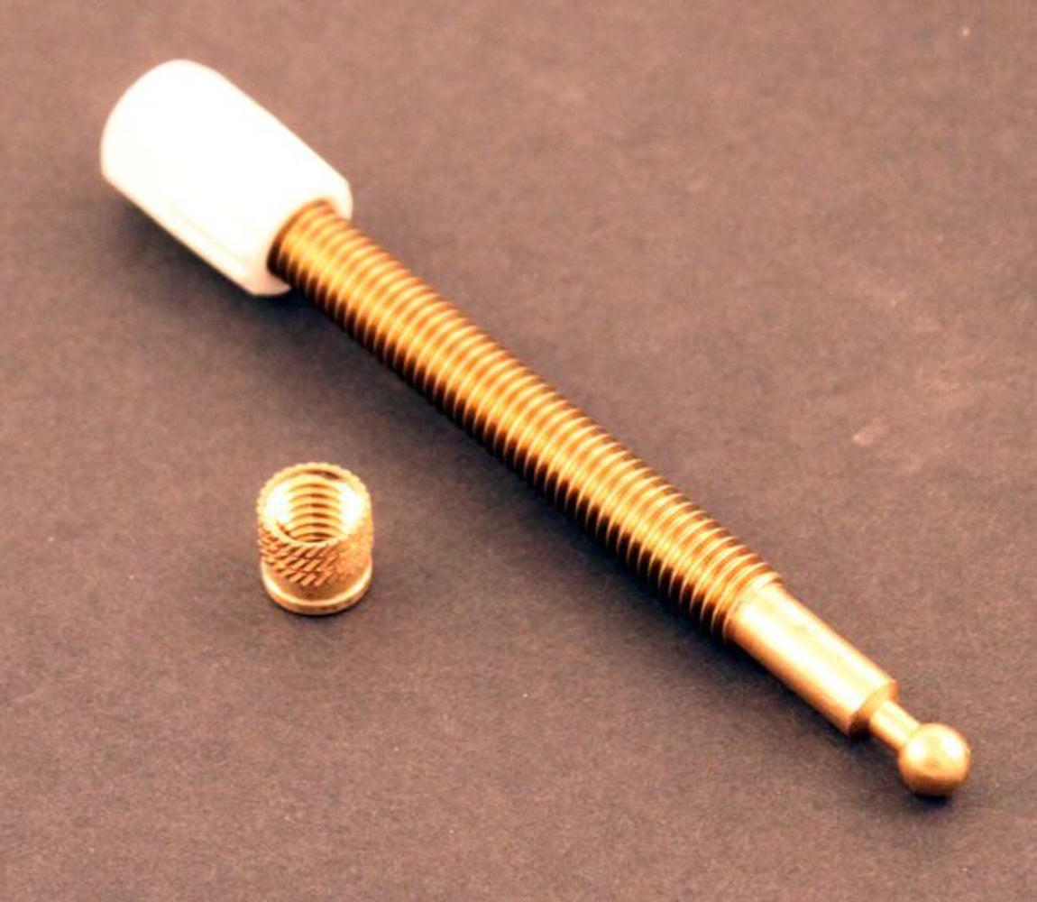 Justeringsskrue strålekaster